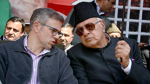 National Conference chief Farooq Abdullah R with Chief Minister Omar Abdullah.