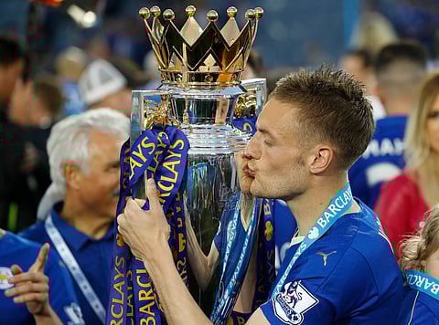 Leicester’s Jamie Vardy kisses the trophy as Leicester City celebrate becoming the EPL champions at King Power stadium in Leicester, England, Saturday, May 7, 2016. | AP