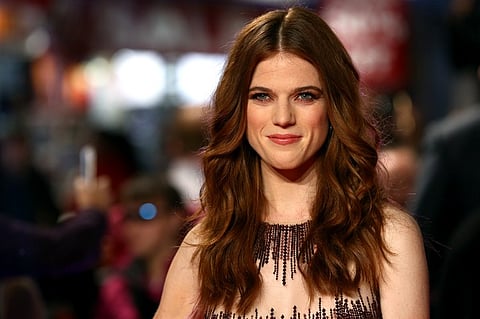 Scottish actress Rose Leslie arrives on the red carpet to attend the European premiere of the film "The Last Witch Hunter" in London. (AFP)