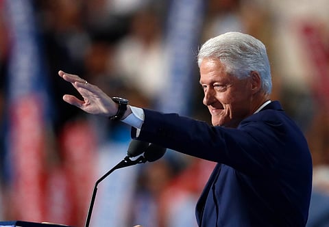 Former President Bill Clinton waves as he takes to the podium during the second day of the Democratic National Convention in Philadelphia. (AP)