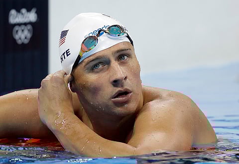 United States' Ryan Lochte checks his time in a men's 4x200-meter freestyle heat during the swimming competitions at the 2016 Summer Olympics, Tuesday, Aug. 9, 2016, in Rio de Janeiro, Brazil. | AP