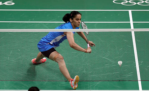 India's Saina Nehwal returns a shot against Brazil's Lohaynny Vicente during a women's badminton match at the 2016 Summer Olympics in Rio de Janeiro, Brazil, Thursday, Aug. 11, 2016. | AP