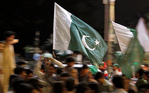 Pakistanis parade through the streets during celebrations to mark the country's Independence Day in Islamabad, Pakistan. (File Photo | AP)
