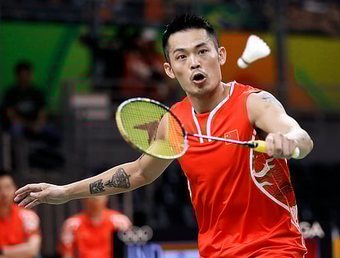 Lin Dan, of China, returns a shot to Srikanth Kidambi, of India, during a men's singles quarterfinal badminton match at the 2016 Summer Olympics in Rio de Janeiro, Brazil, Wednesday, Aug. 17, 2016. | AP