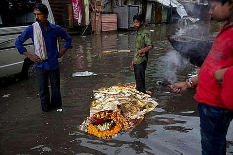 The Ganga in Varanasi is rising at an alarming rate, submerging one ghat after another and flooding temples along the riverfront.