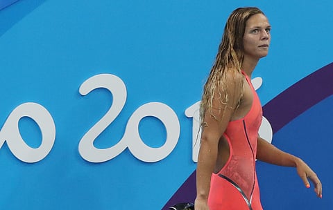 Russia's Yulia Efimova leaves the pool area after competing in a heat of the women's 100-meter breaststroke during the swimming competitions at the 2016 Summer Olympics, Sunday, Aug. 7, 2016, in Rio de Janeiro, Brazil. | AP