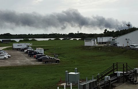 Smoke rises from a SpaceX launch site Thursday, Sept. 1, 2016, at Cape Canaveral, Fla. NASA said SpaceX was conducting a test firing of its unmanned rocket when a blast occurred | AP