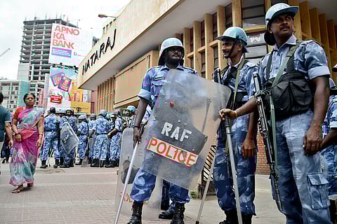 Rapid Action Force personnel were deployed outside Natraj Theater in wake of protest against releasing of Cavery water to Tamil Nadu in Bengaluru on Tuesday. | (Pushkar V | EPS)
