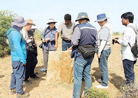 Team members from South Korea inspect a megalithic site in South India | Express