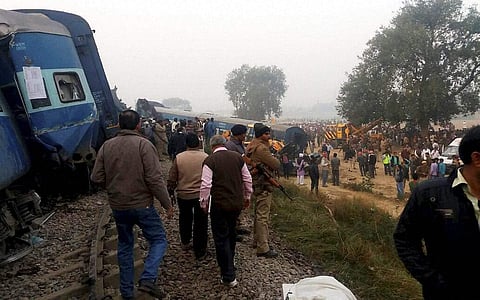 Police officers on the spot where 14 coaches of the Indore-Patna express derailed killing around 90 people and injuring 150 in Kanpur Dehat last year. | PTI