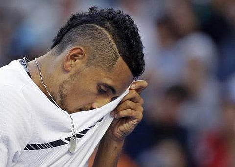 Australia's Nick Kyrgios wipes his face while playing Italy's Andreas Seppi during their second round match at the Australian Open tennis championships in Melbourne, Australia, Wednesday, Jan. 18, 2017.(Photo | AP)