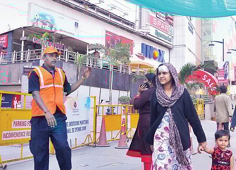 Salesgirl Amreen, who had eight stitches on her forehead, had come to Mantri Mall on Wednesday to collect her belongings from the shop where she worked. She was injured during the wall collapse incident at the mall | vinod kumar t