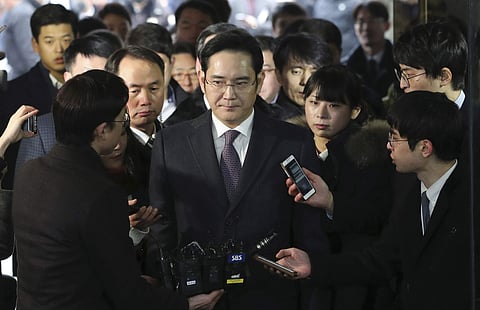Lee Jae-yong, center, a vice chairman of Samsung Electronics Co. arrives at the Seoul Central District Court in Seoul, South Korea, for a hearing Wednesday, Jan. 18, 2017. |AP