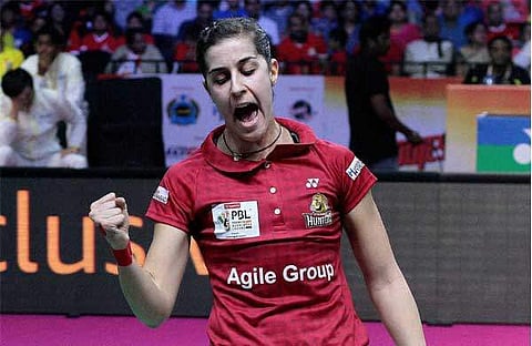 Hyderabad Hyderabd Hunters player Carolina Marin celebrate after the first game against PV Sindhu of Chennai Smashers. (PTI)