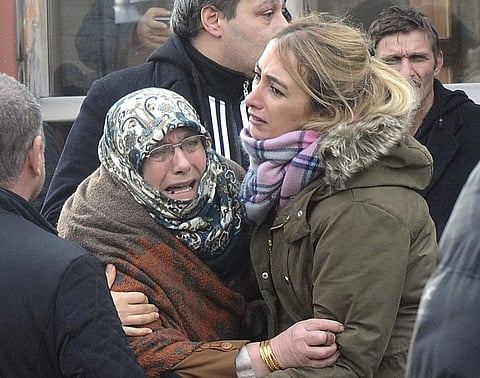 Family members of victims of an overnight attack at a nightclub, cry outside the Forensic Medical Center in Istanbul, Jan. 1, 2017. | AP