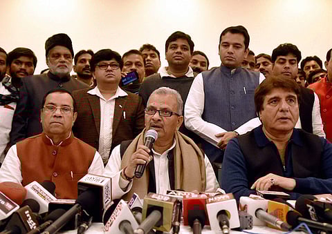: Lucknow Samajwadi Party Vice president Kiranmoy Nanda SP state president Naresh Utam and Congress state president Raj Babbar in joint press conference in Lucknow on Sunday.(Photo | PTI)