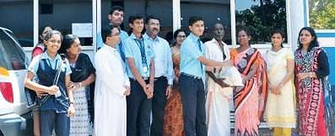 Naipunnya students distributing medicine kit to dialysis patients at Regional Dialysis Centre at Aluva.