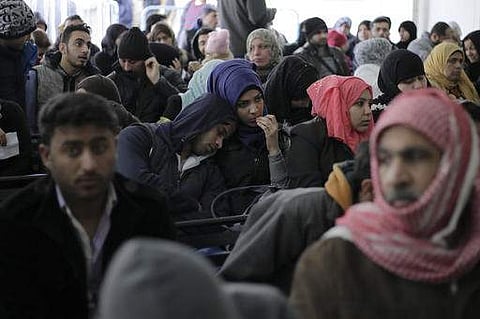 Hundred of Syrian families wait to register at the United Nations High Commissioner for Refugees (UNHCR) headquarters, in Beirut, Lebanon, Monday, Jan. 30, 2017. (AP)