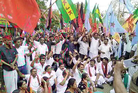 A protest held under the auspices of the DMK and farmers’ organisations in front of the Aanakatti checkpost in Attappadi on Sunday. (File photo)