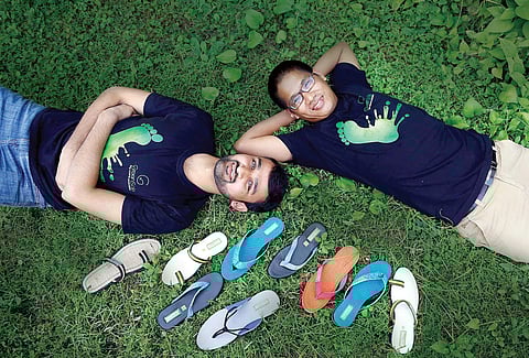 Shriyans Bhandari (left) and Ramesh Dhami with the recycled slippers|Rajneesh Londhe