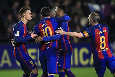 FC Barcelona's Lionel Messi, center, celebrates after scoring with teammates Denis Suarez, left, Neymar, second left, and Iniesta during the Spanish La Liga soccer match between Villarreal and Barcelona at the Ceramica stadium in Villarreal. | AP