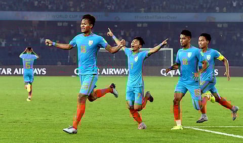 India's Jeakson Thounaojam 15 celebrates after scoring India's first goal during the FIFA U-17 World Cup 2017 football match against Colombia in New Delhi on Monday. | PTI