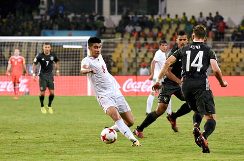 Players of Iran and Germany vie for the ball during their U-17 FIFA World Cup football match at Pandit Jawaharlal Nehru Stadium Fatorda Goa on Tuesday. (Photo | PTI)