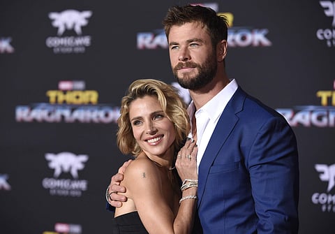 Elsa Pataky, left, and Chris Hemsworth arrive at the world premiere of 'Thor: Ragnarok' at the El Capitan Theatre on Tuesday, Oct. 10, 2017, in Los Angeles. | AP