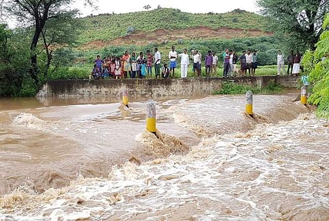 The Chitravati breaches its banks after a decade in Pedapalli village of Anantapur district on Tuesday