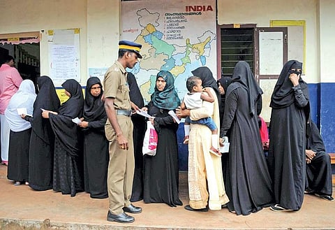 Voters waiting at the polling station at Mamburam LP School in Vengara on Wednesday | A Sanesh