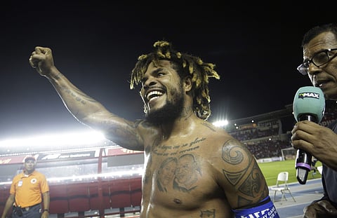 Panama's Roman Torres celebrates his goal against Costa Rica and his team's 2-1 victory, qualifying his team for the 2018 Russia World Cup in Panama City, Tuesday, Oct. 10, 2017. | AP
