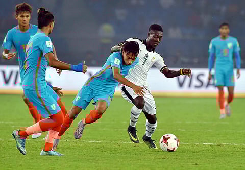 Players of India and Ghana vie for the ball during their U-17 FIFA World cup football match in New Delhi on Thursday. (Photo | PTI)