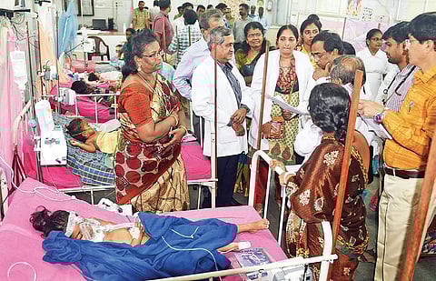 The Central expert team examining the case sheet of a dengue affected child at the Institute of Child Health in Egmore, on Friday | D SAMPATHKUMAR