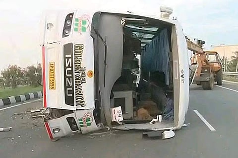 A private bus overturned at Ankirreddypalem on the outskirts of Guntur in the early hours of Friday | Express photo