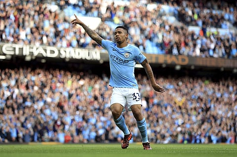 Manchester City's Gabriel Jesus celebrates scoring his side's second goal of the game during the EPL match against Stoke City. | AP