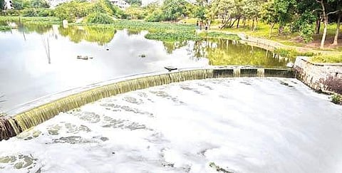 Toxic foam emerging from the Langer Houz lake as a result of improper sewage connections, in Hyderabad on Saturday | r satish babu