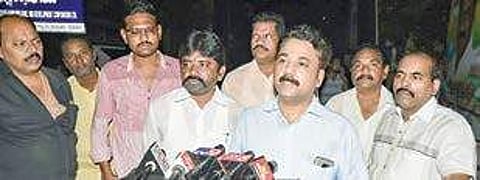 Kapu Corporation MD R Amarendra Kumar holds a press conference in the middle of the road at Suryaraopet in Vijayawada on Sunday | Express