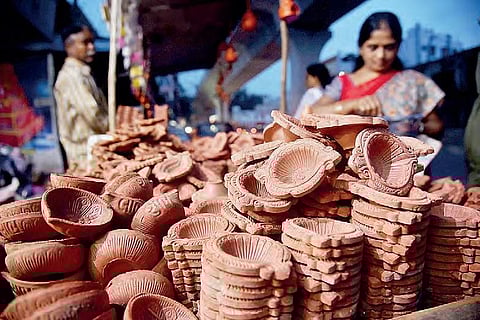 People buying diyas ahead of Diwali in Hyderabad on Monday | r satish babu