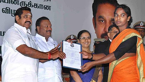 CM Edappadi K Palaniswami issuing appointment order to transgender Praba Mohan, in Chennai on Monday. | Express Photo Service