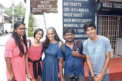 Nalini with her children and the team members at Fort Kochi