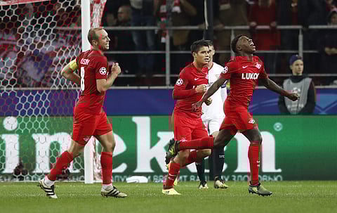 Spartak's Quincy Promes celebrates after scoring his sides 5th goal during the Champions League group E soccer match against Sevilla. | AP