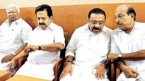 KPCC president M M Hassan has a word with IUML leader P K Kunhalikutty during the UDF northern regional meeting in Kozhikode on Wednesday. Opposition leader Ramesh Chennithala and UDF convener P P Thankachan are also seen | A Sanesh
