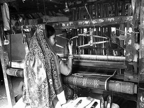 A weaver at work at Kuseapala village