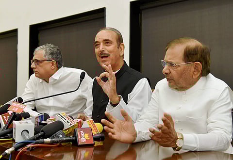 Opposition leaders Ghulam Nabi Azad of Congress Derek O Brien of TMC and JD U rebel leader Sharad Yadav at a press conference to observe November 8 as Black Day to protest note ban in New Delhi on Tuesday. (PTI)