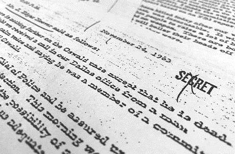 Part of a file, dated Nov. 24, 1963, quoting FBI director J. Edgar Hoover as he talks about the death of Lee Harvey Oswald, released for the first time on October 26 is photographed in Washington. (Photo | AP)