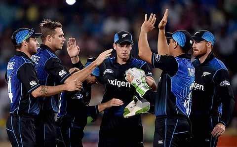 New Zealand bowler Tim Southee celebrates the wicket of Rohit Sharma not in picture with his teammates during 4th ODI in Ranchi on Wednesday. | PTI