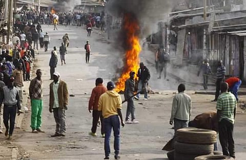 The rioters, some belonging to the Luo ethnic group, looted shops and set fire to a kiosk owned by an ethnic Kikuyu.