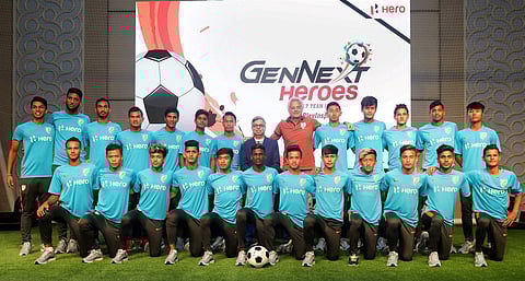 Indian footballers with Pawan Munjal CMD Hero MotoCorp Ltd. during a promotional event ahead of the FIFA U-17 World Cup in Gurugram on Saturday. | PTI