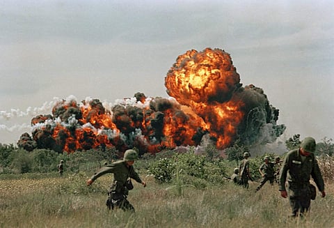 U.S. forces used napalm strikes, during the Vietnam War, to disrupt the places where Vietcong were finding cover. In this photo, taken by an unnamed Associated-Press photographer in 1966, we see a fireball erupt after a napalm strike.