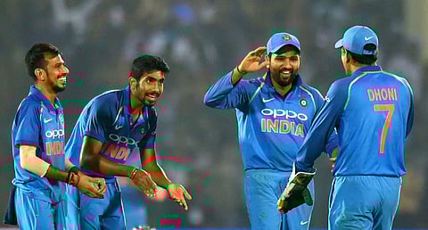 India's Yuzvendra Chahal celebrates the wicket of New Zealand batsman Tom Latham with teammates during third ODI in Kanpur on Sunday. | PTI